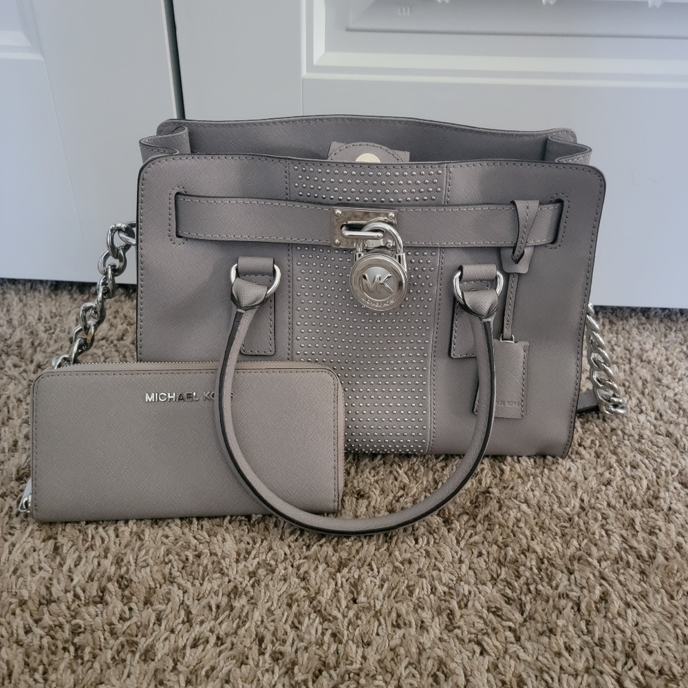 Authentic Michael Kors Hamilton East West with matching MK Wallet.